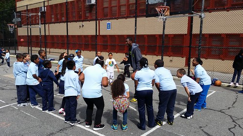 WITS Coach Rob Sanders leading students in a fun and interactive game on the recess yard